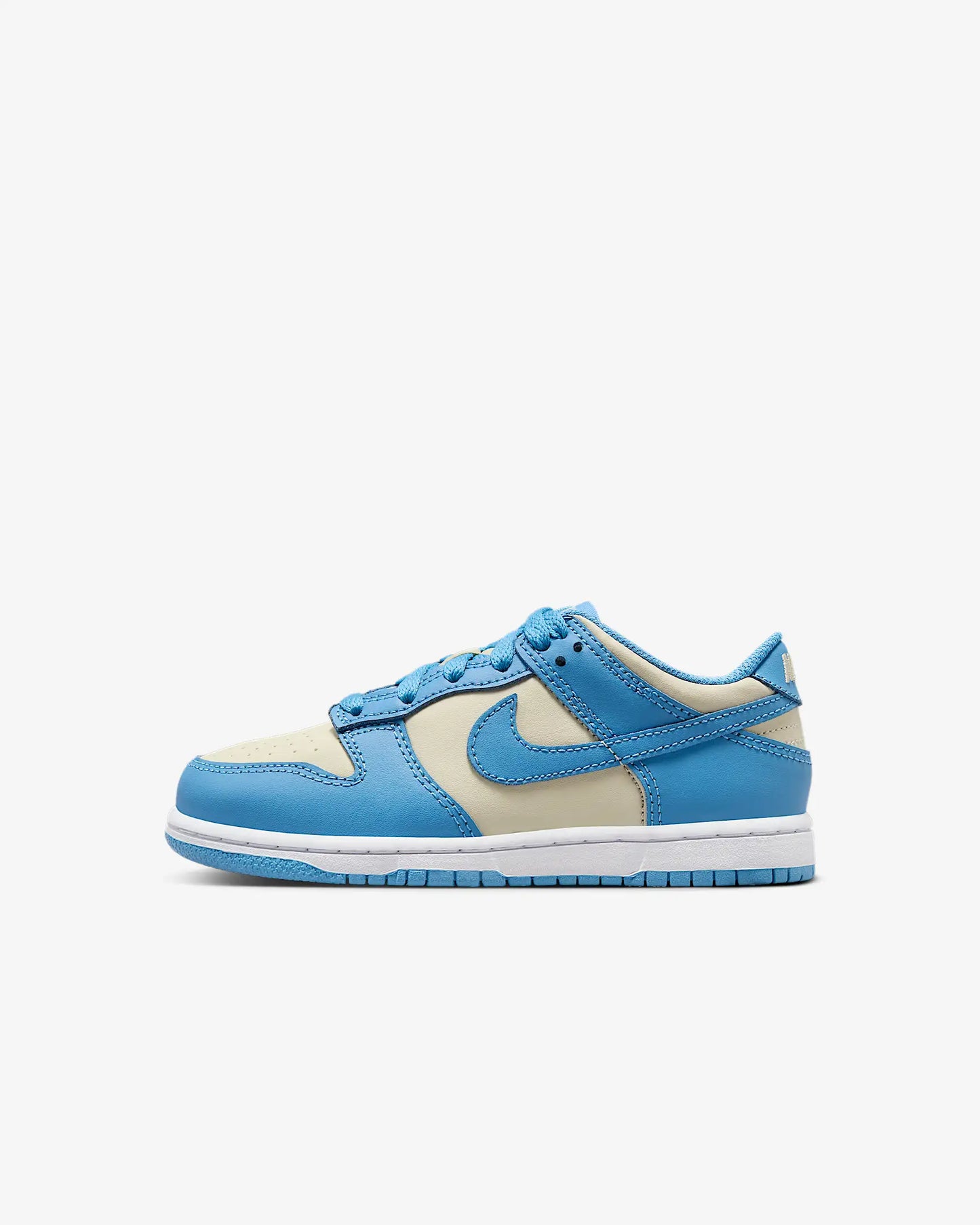 A pair of kids' Nike Dunk Low sneakers in white and blue