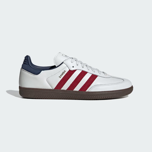 White Adidas sneaker with red stripes on a light gray background
