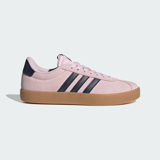 Pink Adidas sneaker with three black stripes on a light gray background