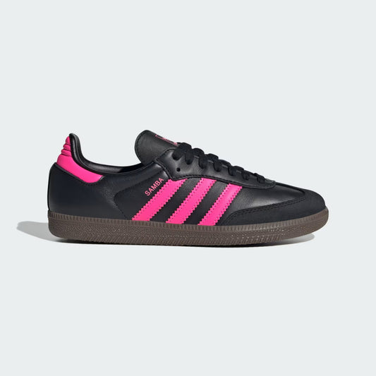 Black Adidas sneaker with pink stripes on a light gray background