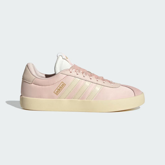 Pink Adidas sneaker on a light gray background